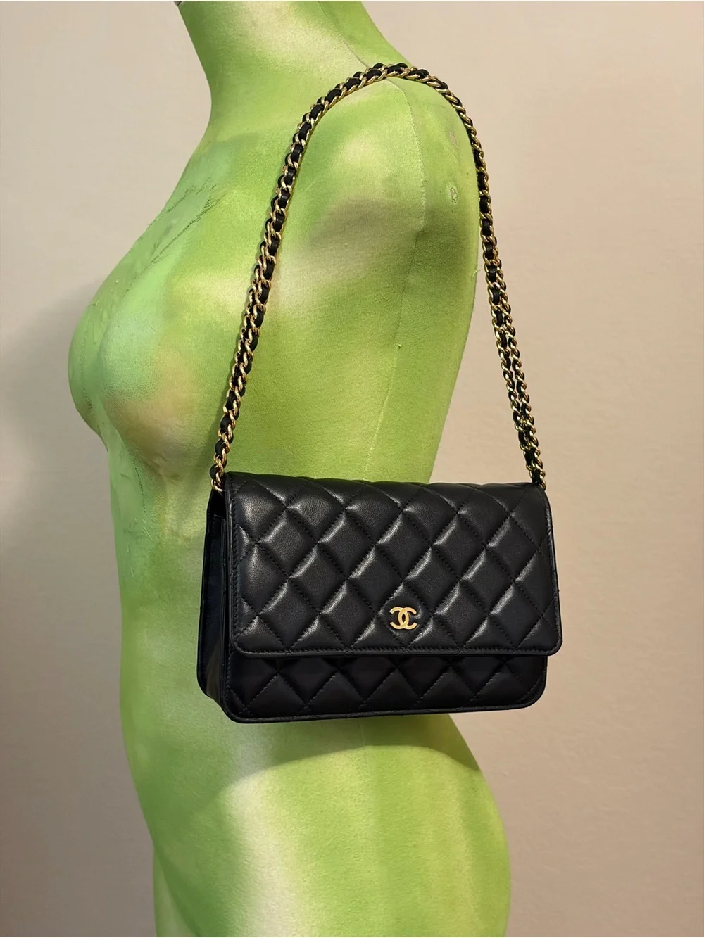 CHANEL Black Quilted Leather Wallet-on-Chain with Gold Hardware